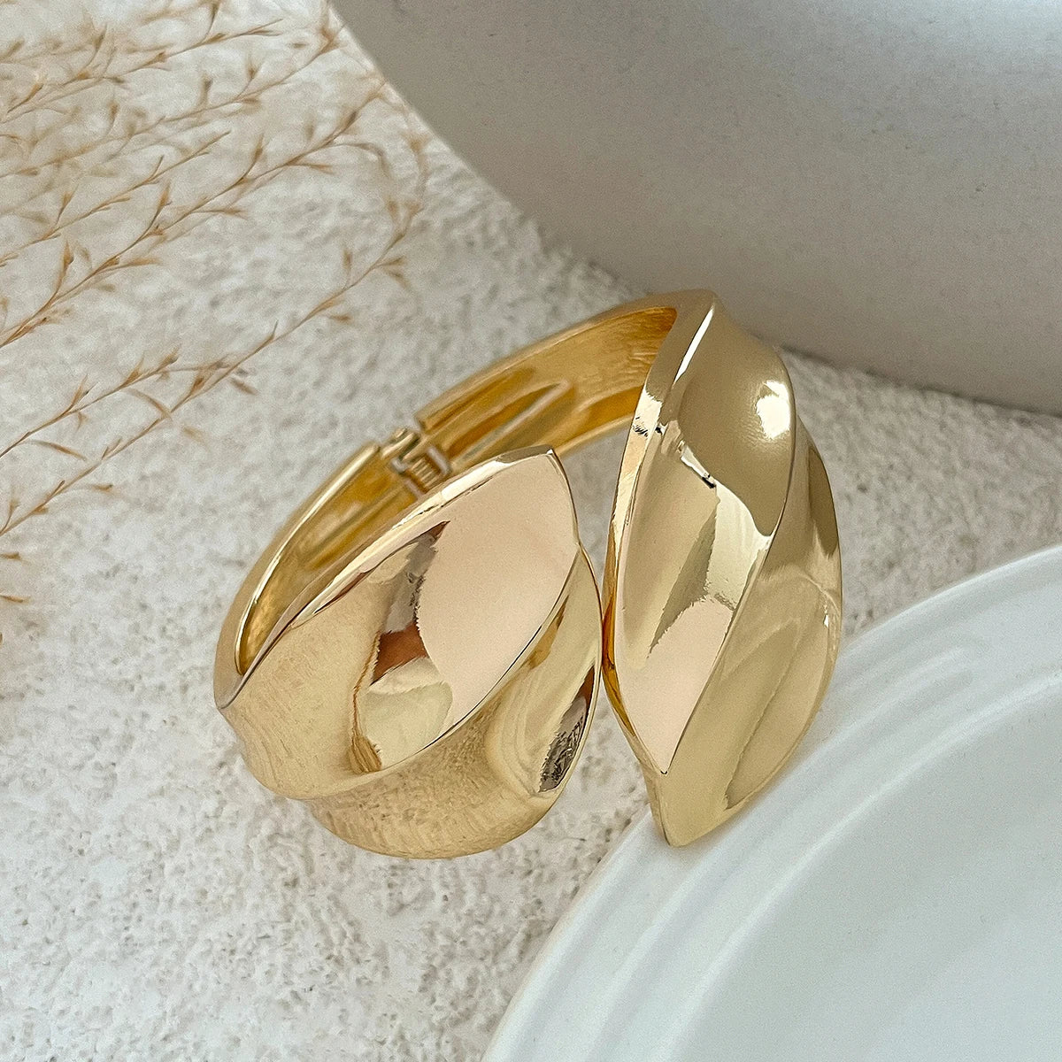 KH Wide Cuff Bangles, designed to embody confidence, elegance, and timeless luxury.