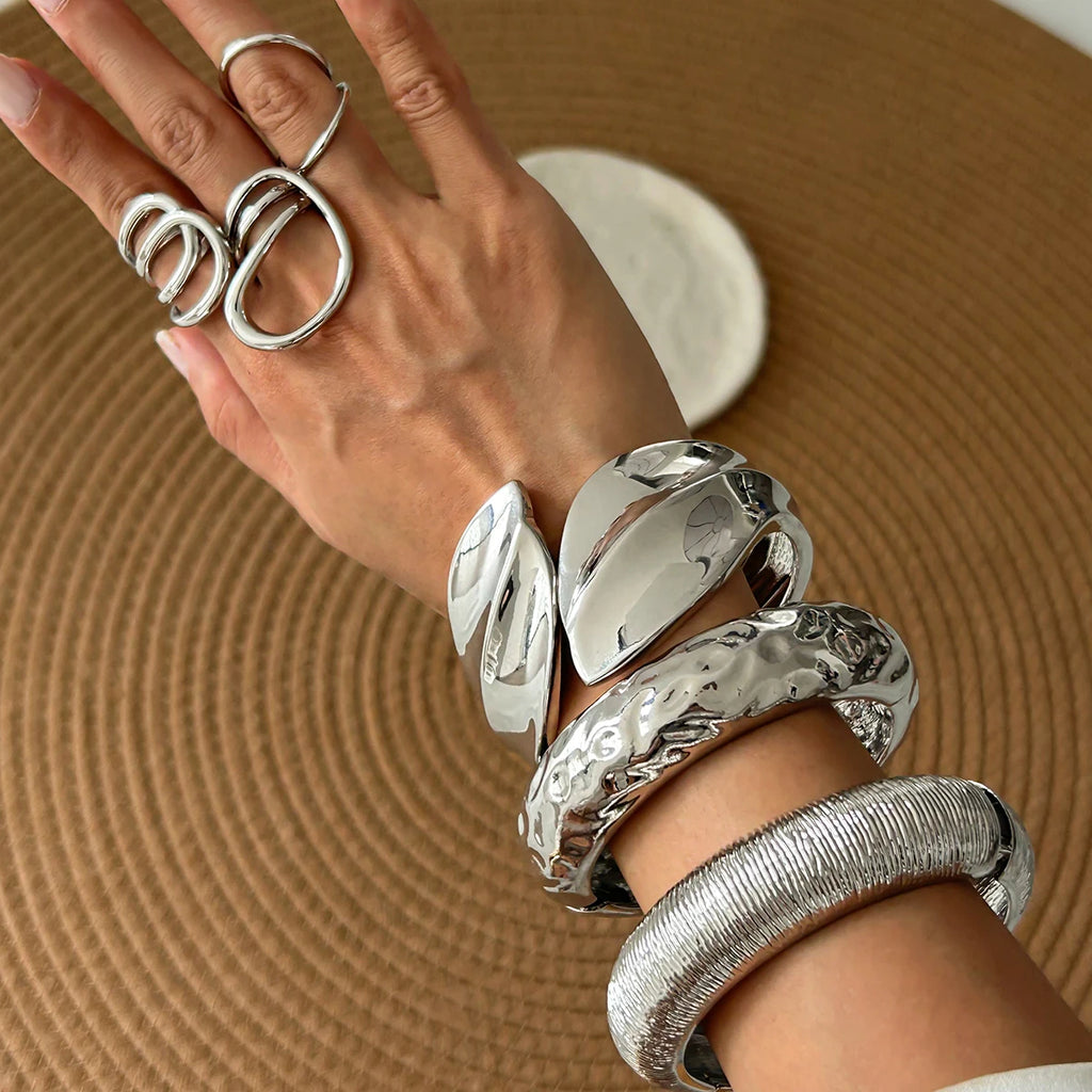 KH Wide Cuff Bangles, designed to embody confidence, elegance, and timeless luxury.