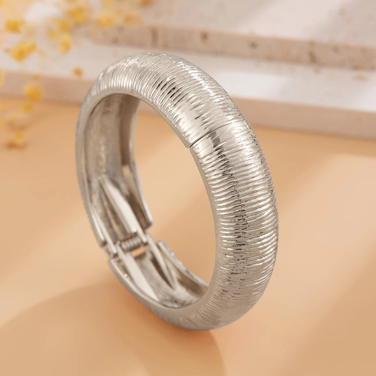 KH Wide Cuff Bangles, designed to embody confidence, elegance, and timeless luxury.