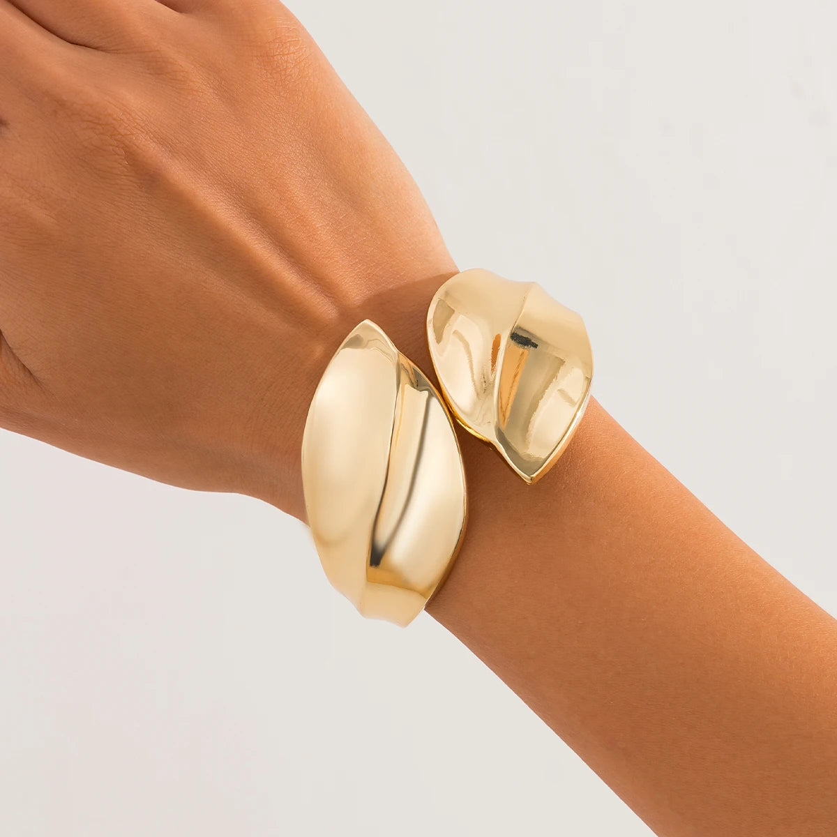 KH Wide Cuff Bangles, designed to embody confidence, elegance, and timeless luxury.