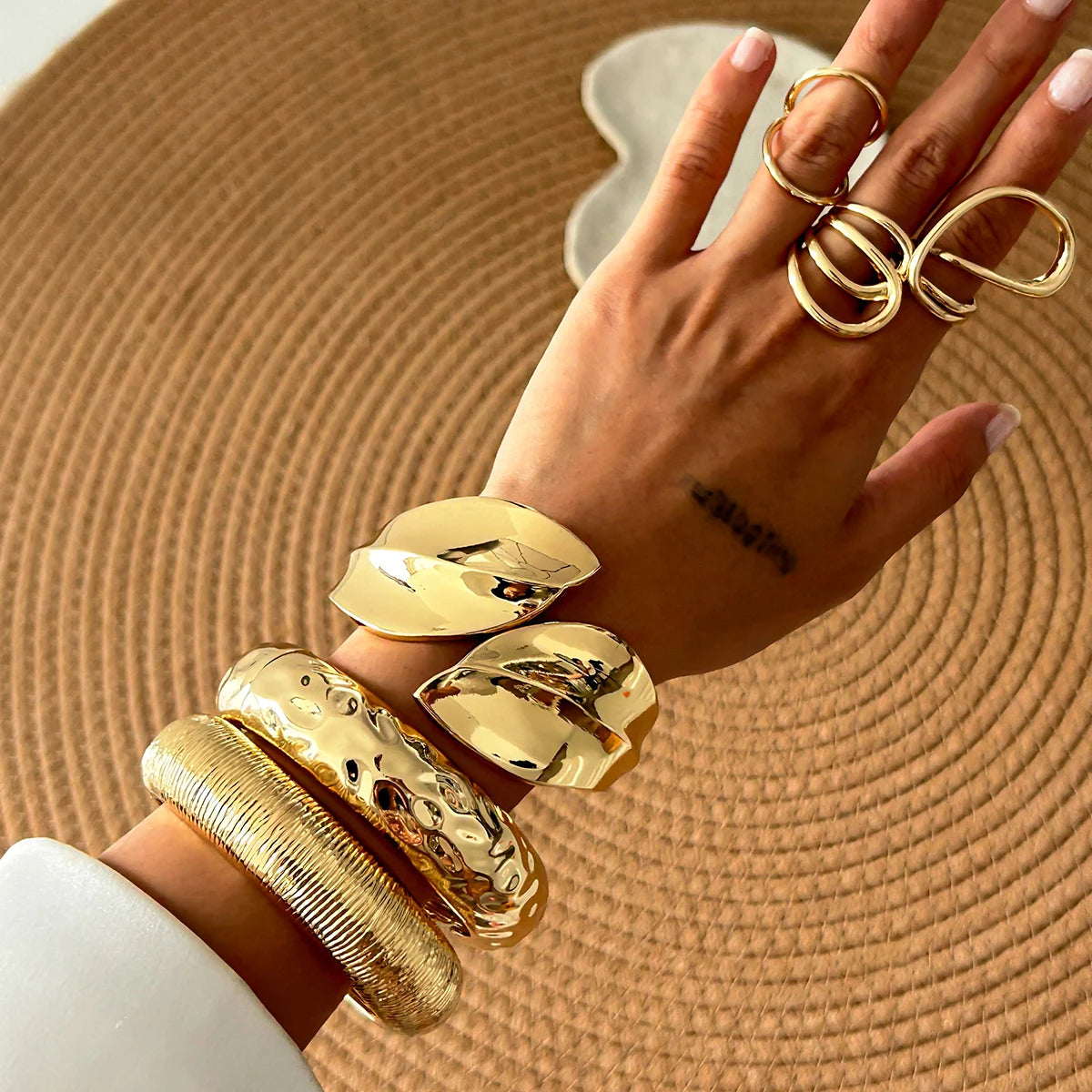 KH Wide Cuff Bangles, designed to embody confidence, elegance, and timeless luxury.