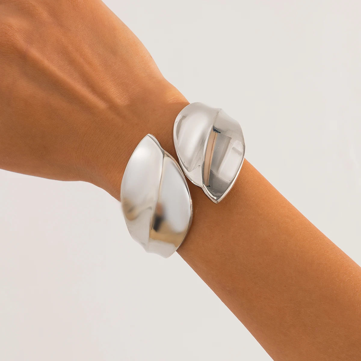 KH Wide Cuff Bangles, designed to embody confidence, elegance, and timeless luxury.